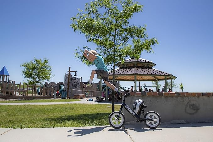Strider 12” Pro Bike, No Pedal Balance Bicycle for Kids 1 to 4 Years - Includes Safety Pad, Padded Seat, Mini Grips & Flat-Free Tires - Tool Free