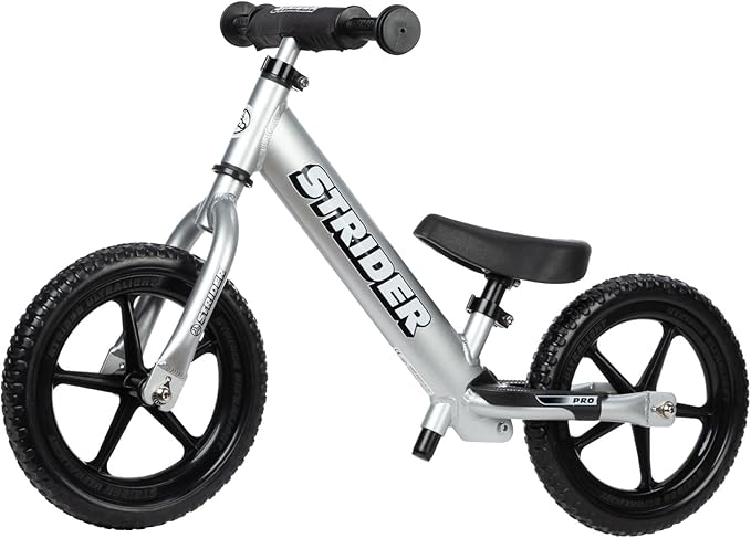 Strider 12” Pro Bike, No Pedal Balance Bicycle for Kids 1 to 4 Years - Includes Safety Pad, Padded Seat, Mini Grips & Flat-Free Tires - Tool Free