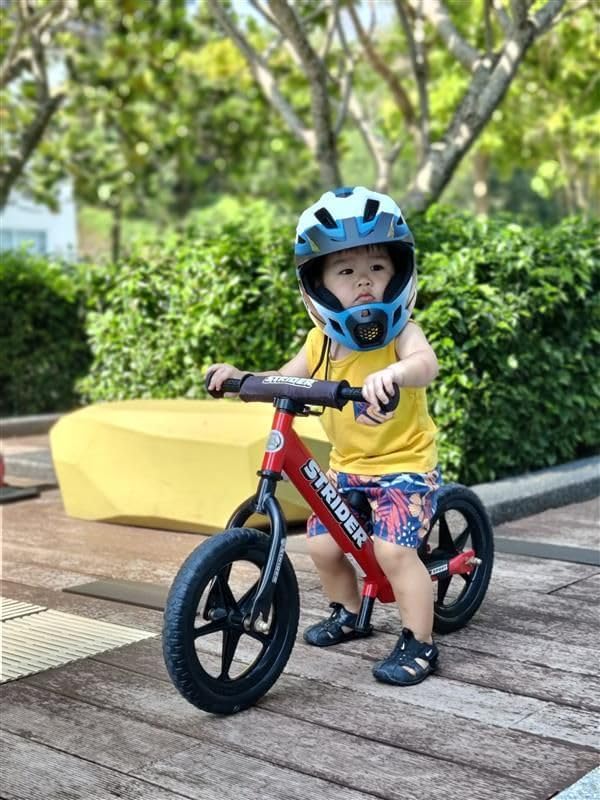 Strider 12” Sport Bike - No Pedal Balance Bicycle for Kids 1 to 4 Years - Includes Safety Pad, Padded Seat, Mini Grips & Flat-Free Tires - Tool-Free Assembly & Adjustments