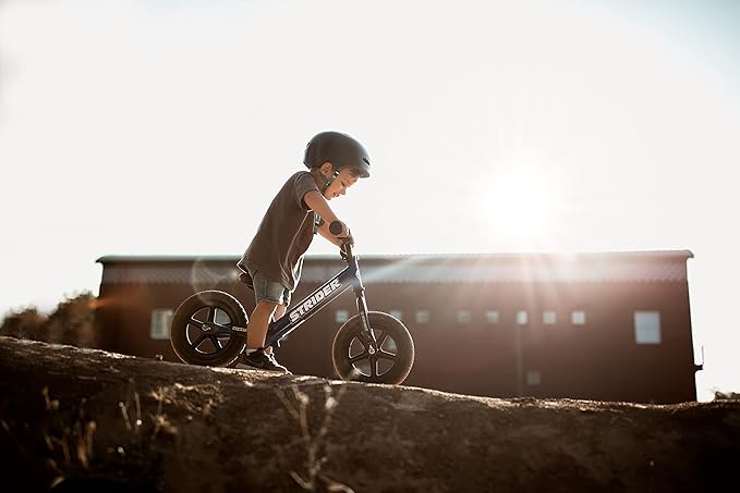 Strider 12” Sport Bike - No Pedal Balance Bicycle for Kids 1 to 4 Years - Includes Safety Pad, Padded Seat, Mini Grips & Flat-Free Tires - Tool-Free Assembly & Adjustments