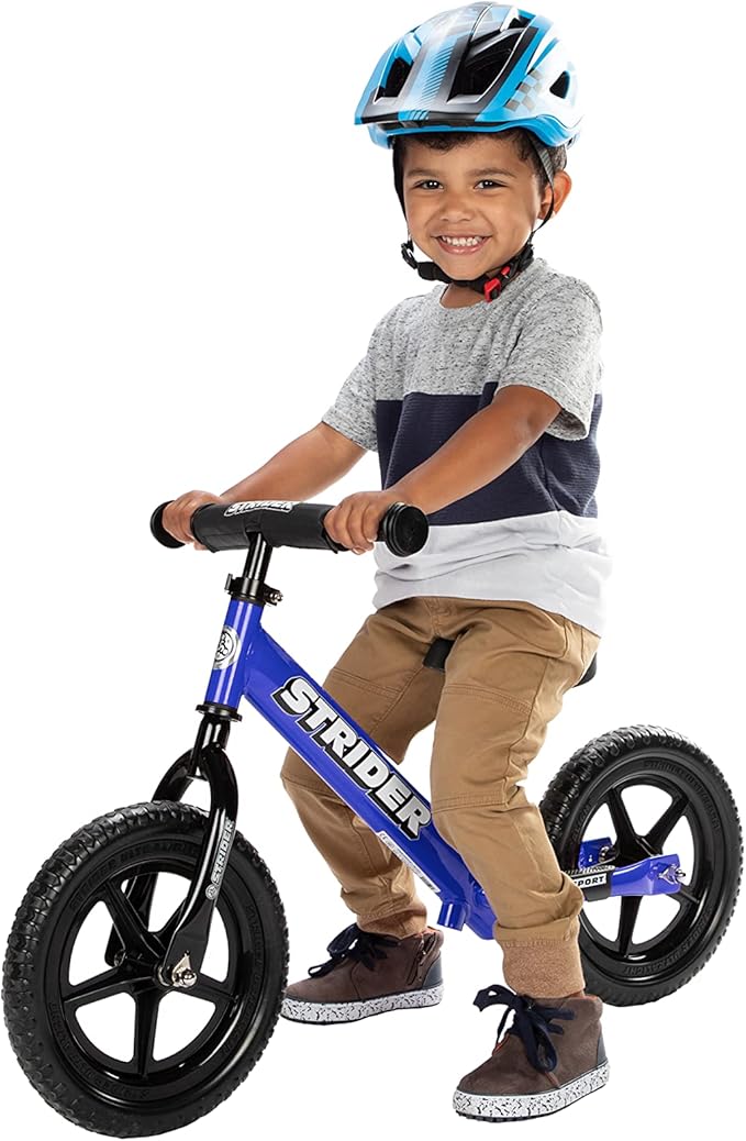 Strider 12” Sport Bike - No Pedal Balance Bicycle for Kids 1 to 4 Years - Includes Safety Pad, Padded Seat, Mini Grips & Flat-Free Tires - Tool-Free Assembly & Adjustments