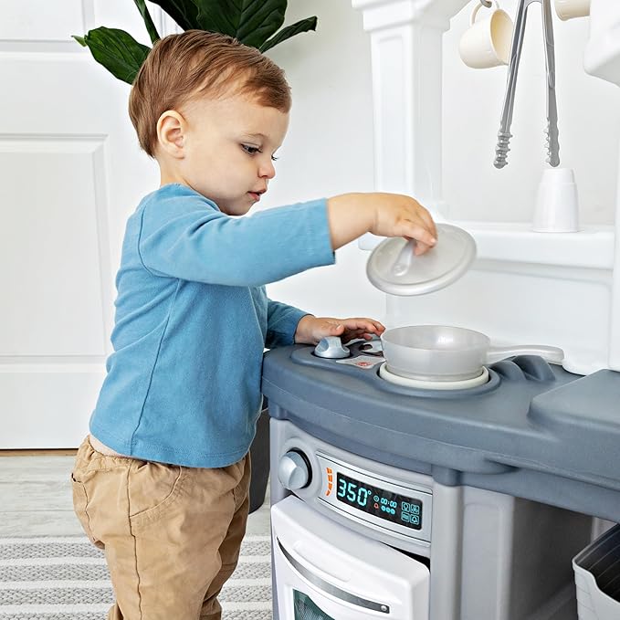Step2 Fun with Friends Kids Kitchen Playset, Indoor/Outdoor Kitchenette, Interactive Play with Lights and Sounds, Durable Plastic, Includes 25 Piece Toy Accessories, Toddlers 2+ Years Old, Gray
