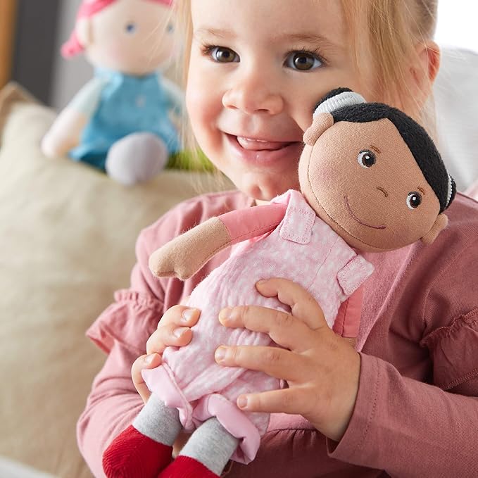 HABA Snug Up Doll Rumbi - 10" Soft Doll with Black Hair and Pink Overalls - Machine Washable for 18 Months and Up