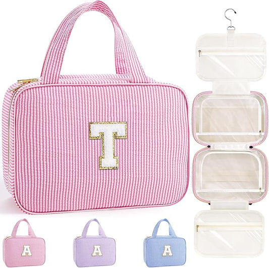 TOPEAST Hanging Toiletry Bag for Women - Travel Toiletry Bag Makeup Bag, Portable Toiletries Cosmetic Bag, Airplane Travel Essentials - Letter T, Pink