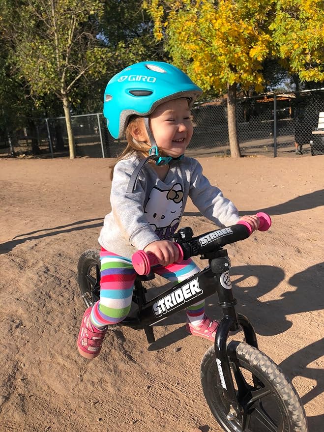 Strider 12” Sport Bike - No Pedal Balance Bicycle for Kids 1 to 4 Years - Includes Safety Pad, Padded Seat, Mini Grips & Flat-Free Tires - Tool-Free Assembly & Adjustments