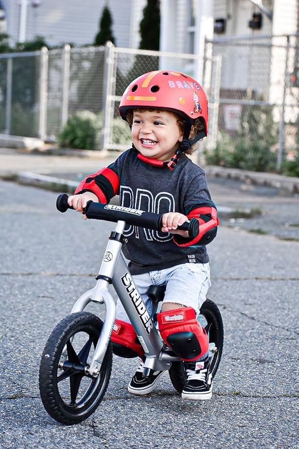 Strider 12” Pro Bike, No Pedal Balance Bicycle for Kids 1 to 4 Years - Includes Safety Pad, Padded Seat, Mini Grips & Flat-Free Tires - Tool Free
