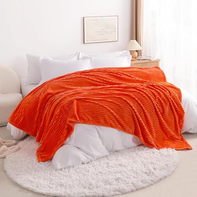 NTBAY Plush Flannel Twin Bed Blanket, 60x80 Inches Soft and Warm Lightweight Bed Blanket with Striped Texture for Couch, Sofa, All Seasons, Orange
