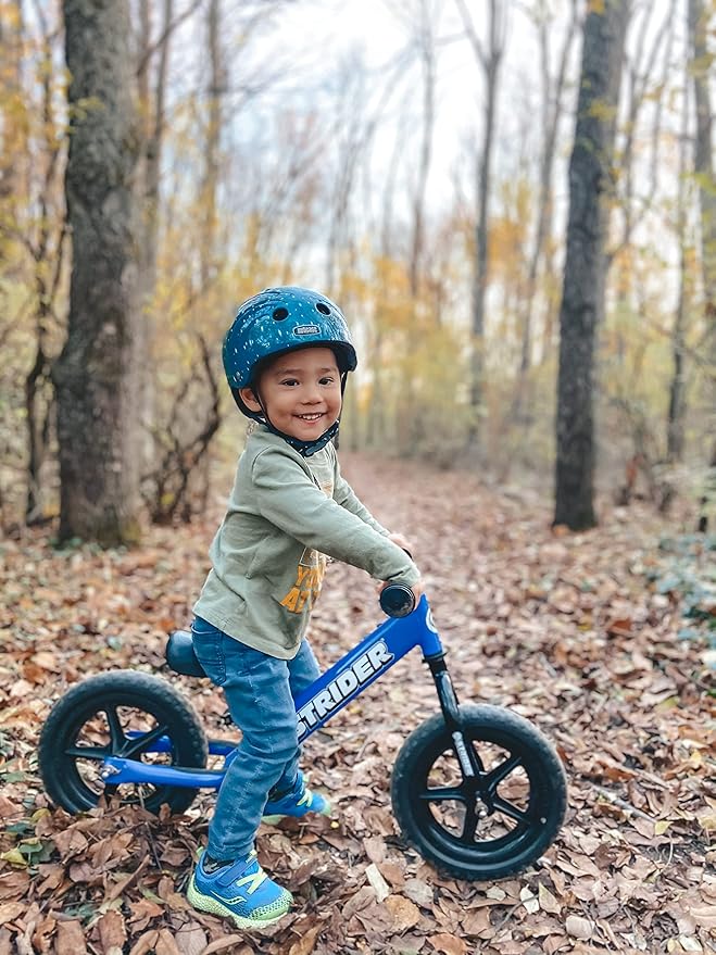 Strider 12” Sport Bike - No Pedal Balance Bicycle for Kids 1 to 4 Years - Includes Safety Pad, Padded Seat, Mini Grips & Flat-Free Tires - Tool-Free Assembly & Adjustments