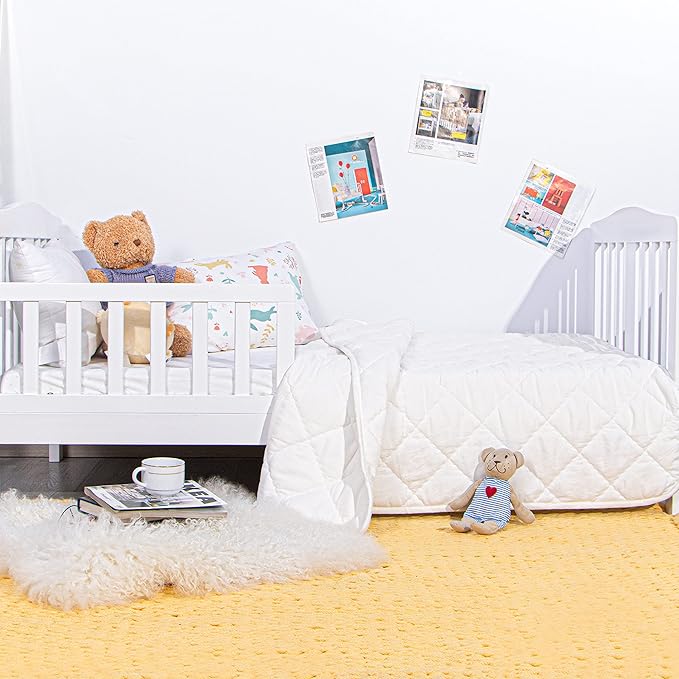 NTBAY Down Alternative Toddler Comforter, Lightweight and Warm Solid Color Baby Crib Quilted Blanket, 39x47 inches, White