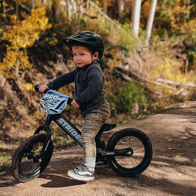 Strider 12” Pro Bike, No Pedal Balance Bicycle for Kids 1 to 4 Years - Includes Safety Pad, Padded Seat, Mini Grips & Flat-Free Tires - Tool Free