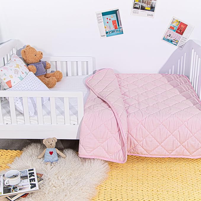 NTBAY Down Alternative Toddler Comforter, Lightweight and Warm Solid Color Baby Crib Quilted Blanket, 39x47 inches, Pink