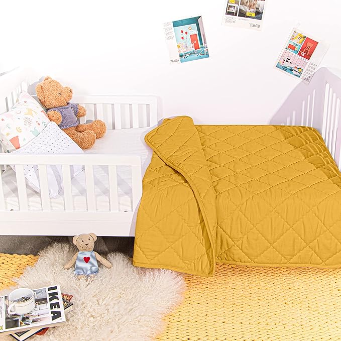 NTBAY Down Alternative Toddler Comforter, Lightweight and Warm Solid Color Baby Crib Quilted Blanket, 39x47 inches, Yellow